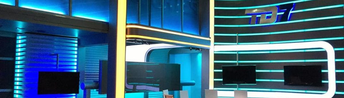 TD7 television set lit with blue, red and yellow LED light panels